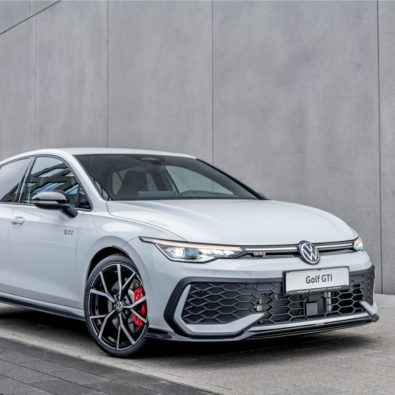 Close-up of stainless steel rear protection strip on the rear of a VW Golf.